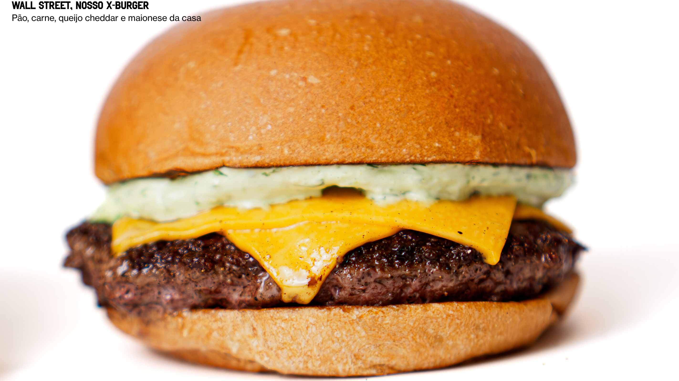 Wall Street, nosso x-burger. Pão, carne, queijo cheddar e maionese da casa.